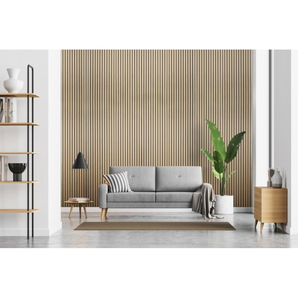 Oak acoustic wall paneling installed as a feature wall behind a grey sofa in a modern living room interior.