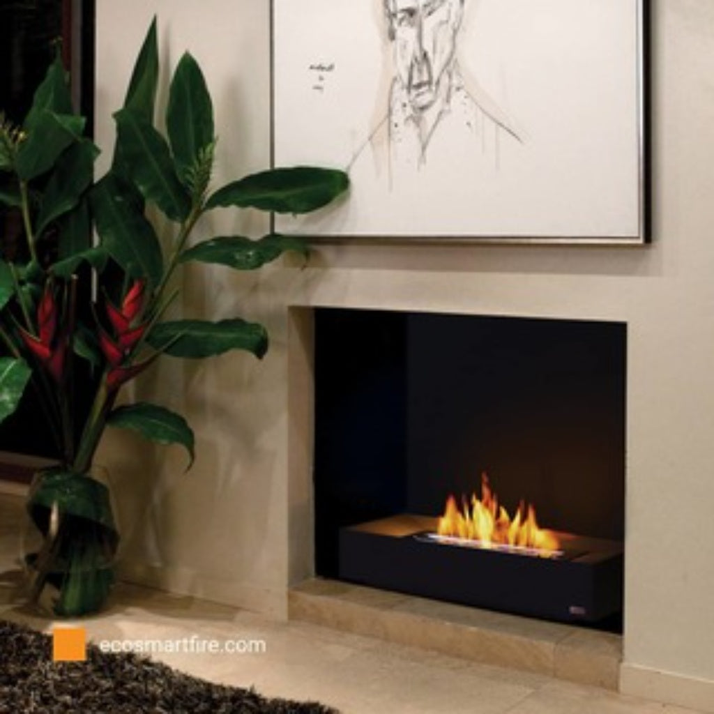 EcoSmart Fire Grate 36 black rectangular bioethanol fireplace insert with a vibrant flame inside a modern hearth.