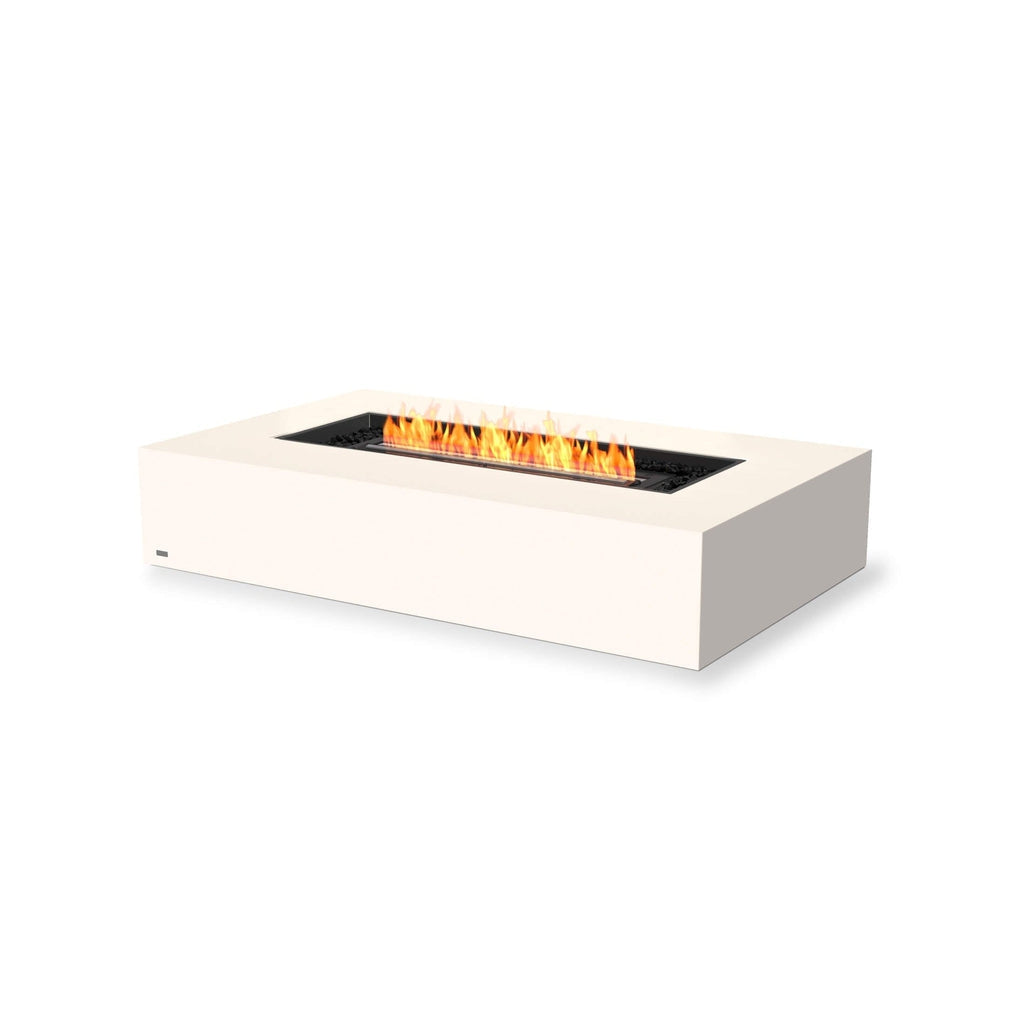 EcoSmart Fire Wharf 65 ethanol fire pit table in off-white with a central black burner and orange flames.