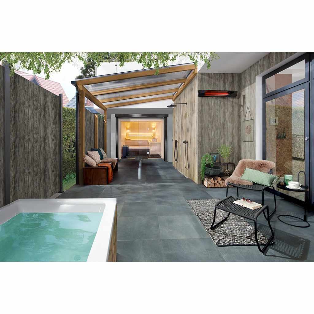 Heatscope Heaters Pure+ 3000W electric radiant heater mounted on a grey wall above a modern outdoor patio area.