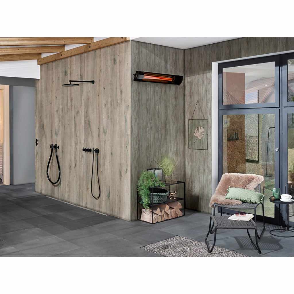 Heatscope Heaters Pure+ 3000W electric radiant heater mounted on a wood-effect wall in a modern patio setting.