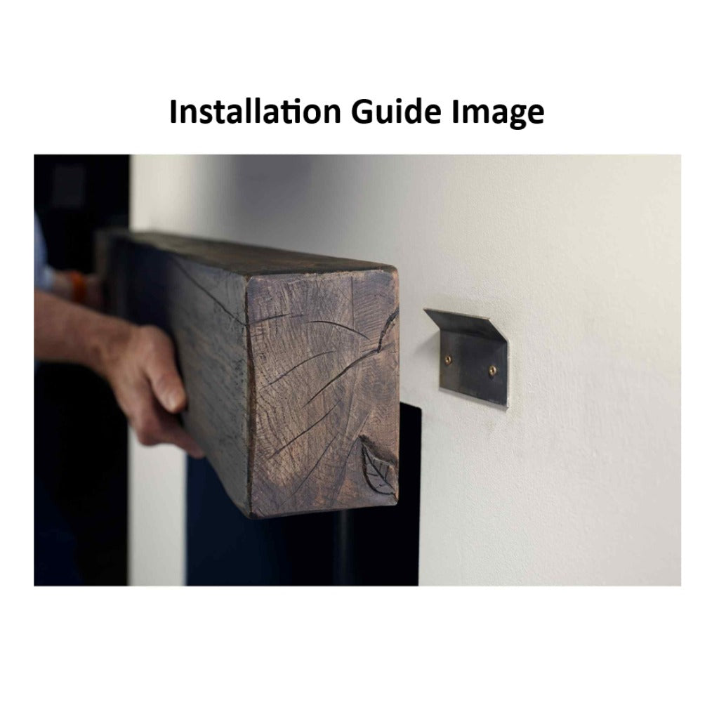 Hand installing an OER 48 Inch Urban Finish fireplace beam onto a wall-mounted metal bracket.