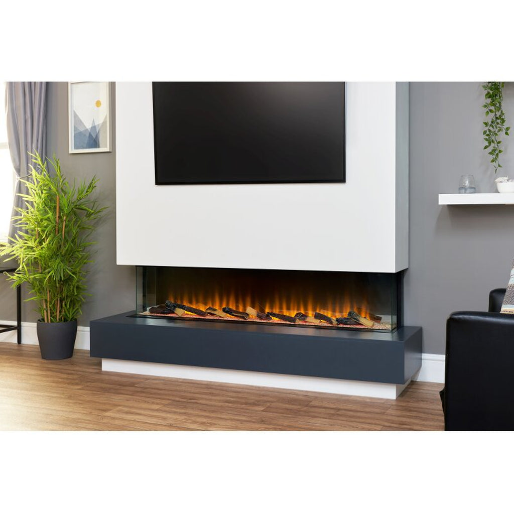 Sahara 61 Inch Electric Inset Media Wall Fire with three-sided glass, glowing logs, and orange flames in a modern room.