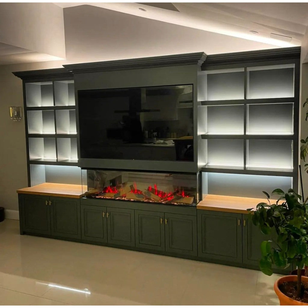 Vision Futura 60 inch 3-sided electric fire insert set within a dark green media wall with shelving and a mounted TV.