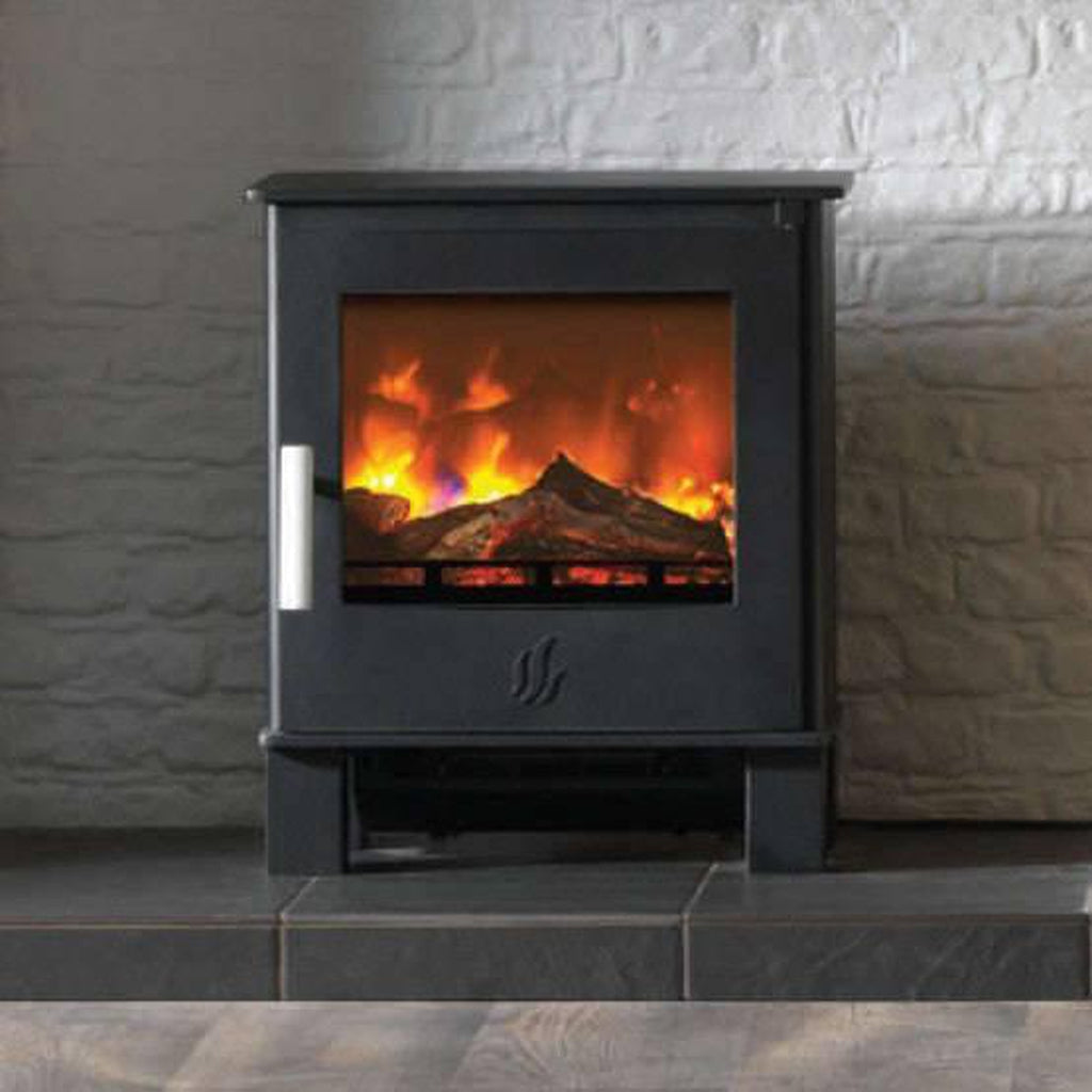 ACR Malvern HD electric stove in black with a realistic log flame effect, set on a dark tiled hearth against brick.