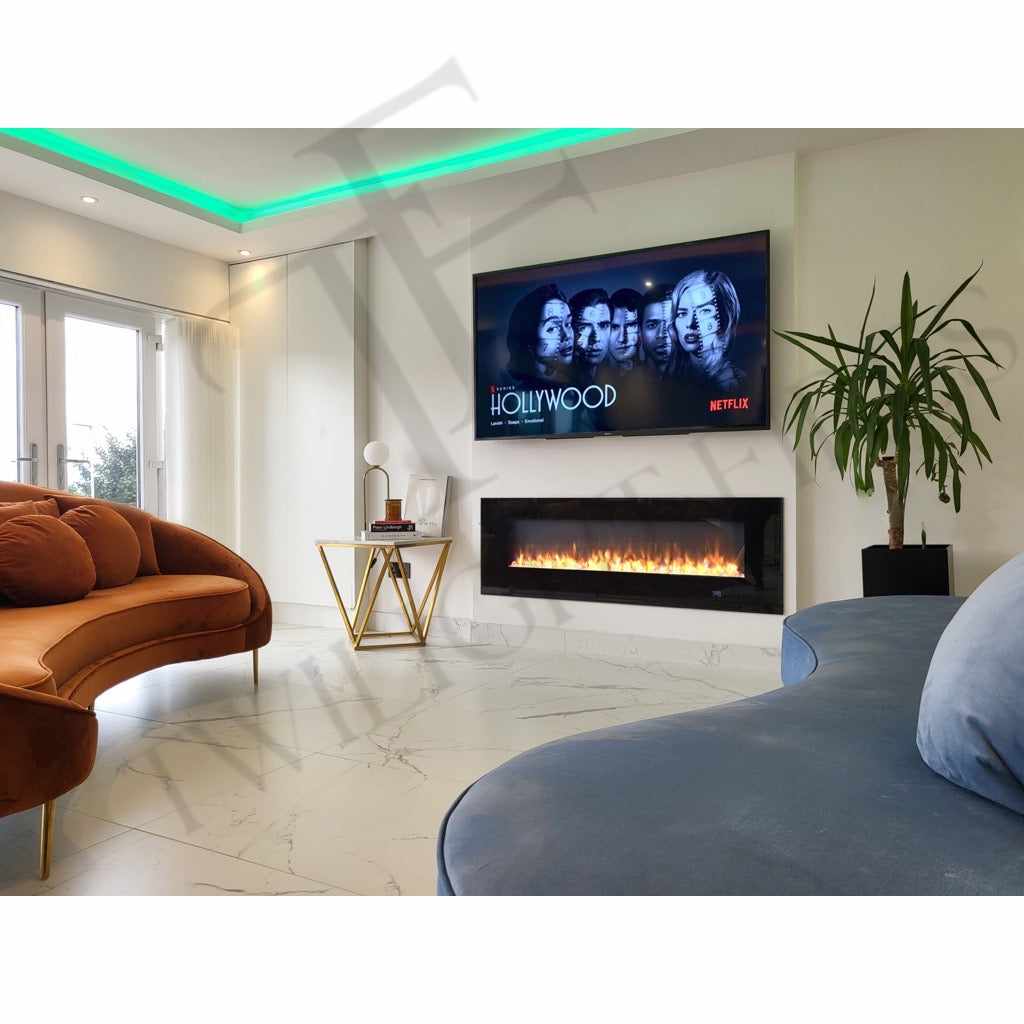 Aurora 60 Inch Media Wall Electric Fire Insert with black glass frame and glowing orange flames in a modern living room.