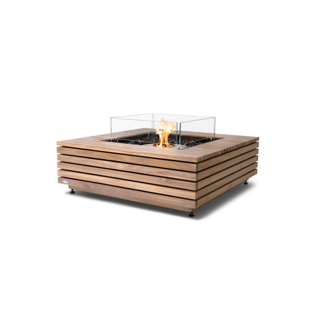 EcoSmart Fire Base 40 square teak slatted fire pit table with a central glass screen and lit bioethanol burner.
