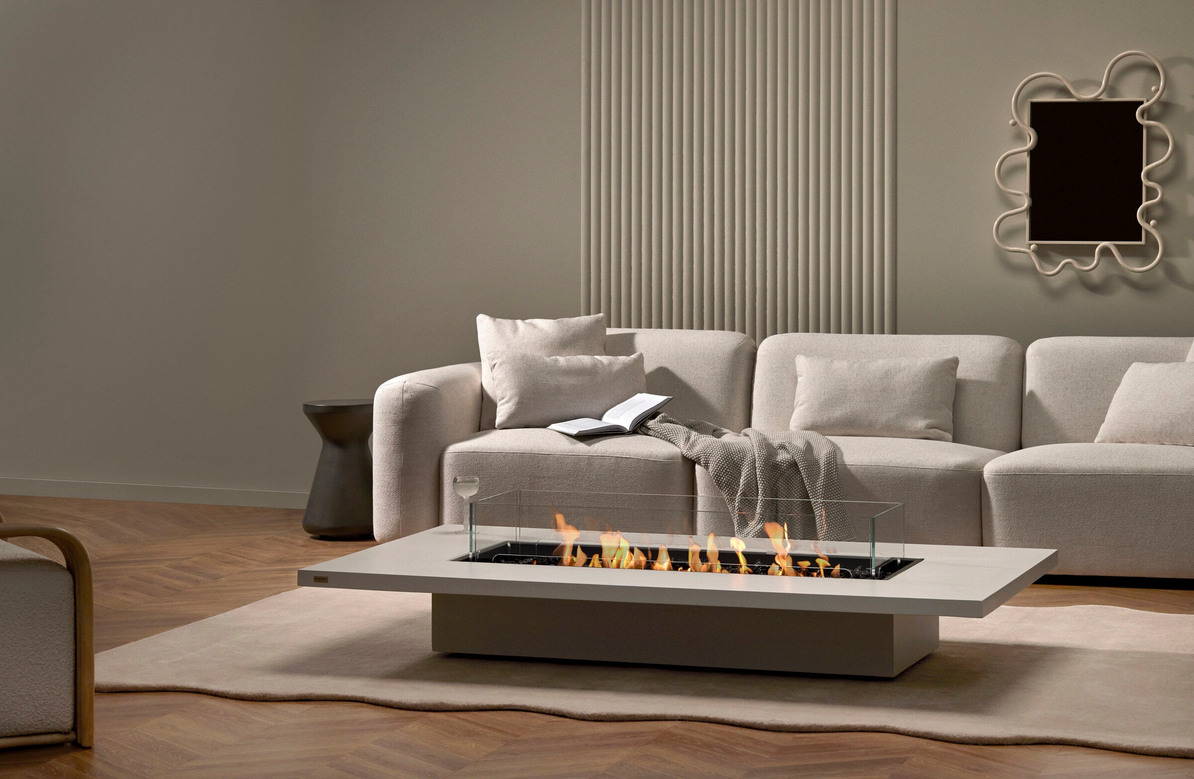 Daiquiri 70 linear fire pit table in a contemporary outdoor setting