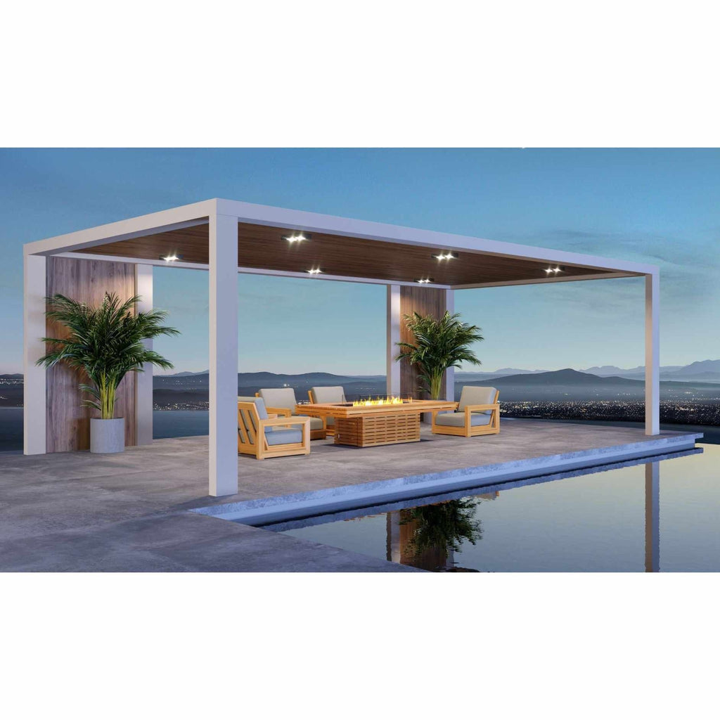 EcoSmart Fire Gin 90 bioethanol fire pit table with light wood finish, set on a terrace by an infinity pool at dusk.