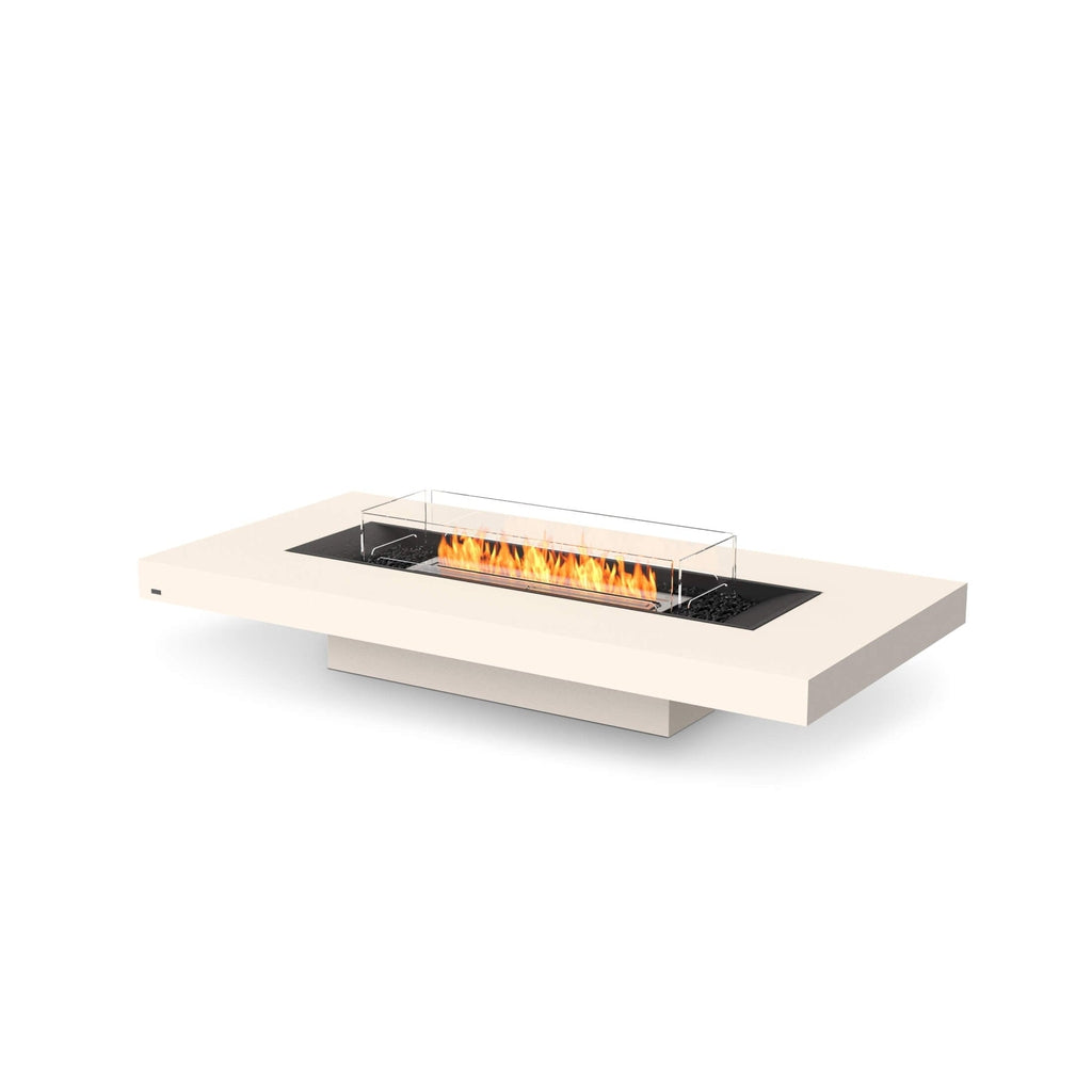 EcoSmart Fire Gin 90 low bioethanol fire pit table in cream with a central flame, black burner, and glass screen.