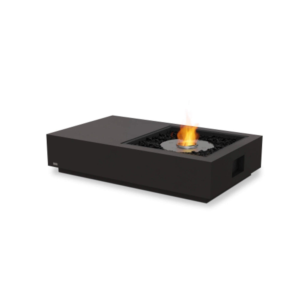 EcoSmart Fire Manhattan 50 bioethanol fire pit table in black with a central burner and black decorative stones.