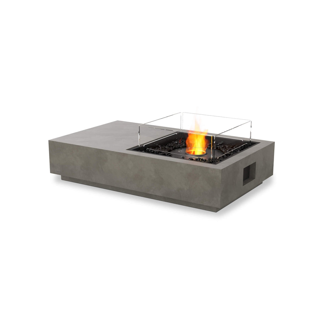 EcoSmart Fire Manhattan 50 bioethanol fire pit table in grey concrete with a central flame and glass screen.