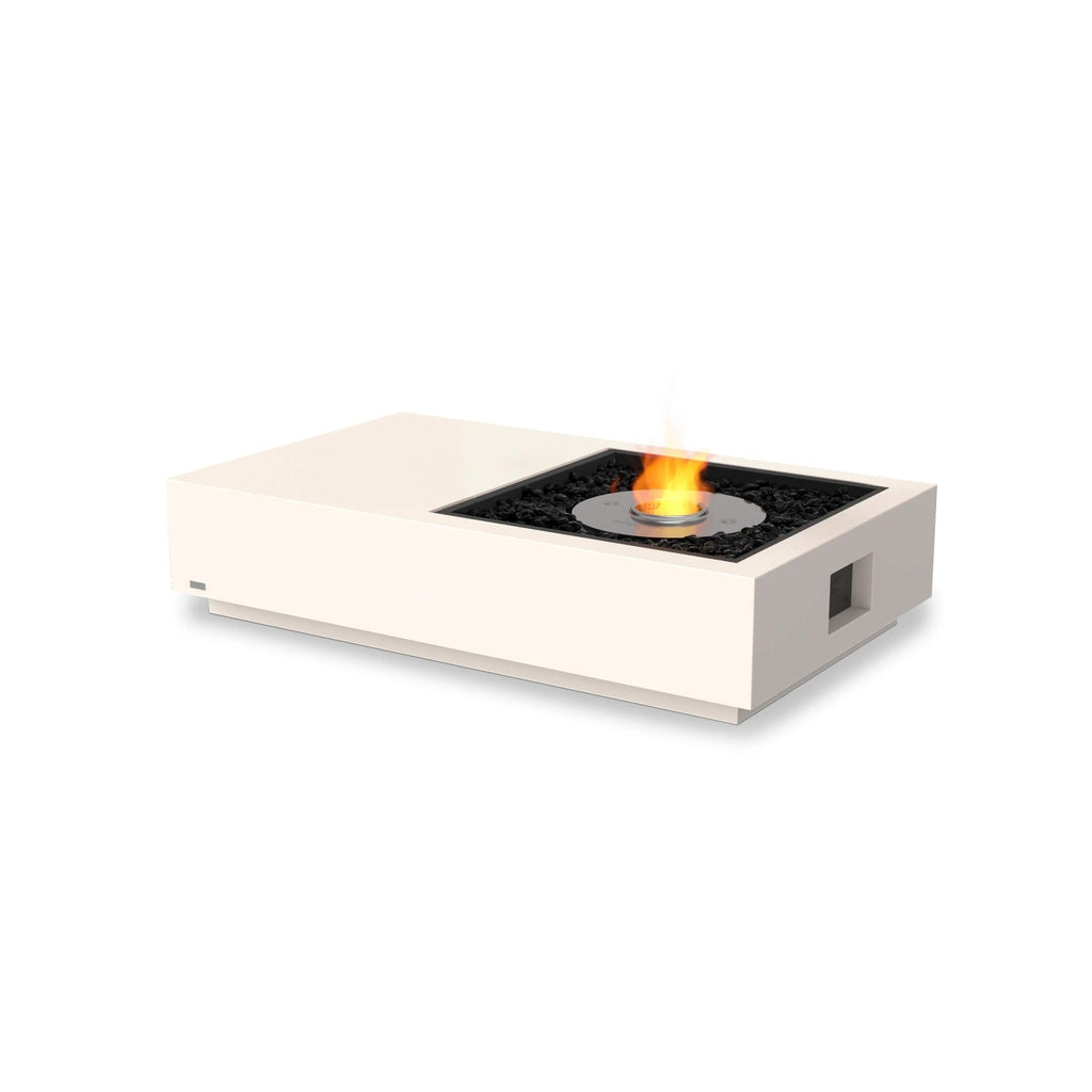 EcoSmart Fire Manhattan 50 bioethanol fire pit table in cream with a central burner and black decorative stones.