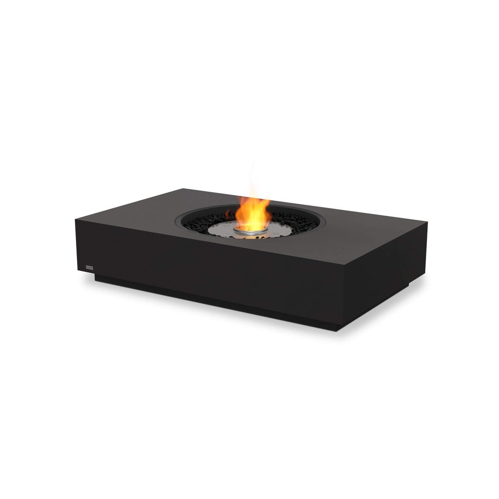 EcoSmart Fire Martini 50 bioethanol fire pit table in matte black with a central flame and black decorative stones.