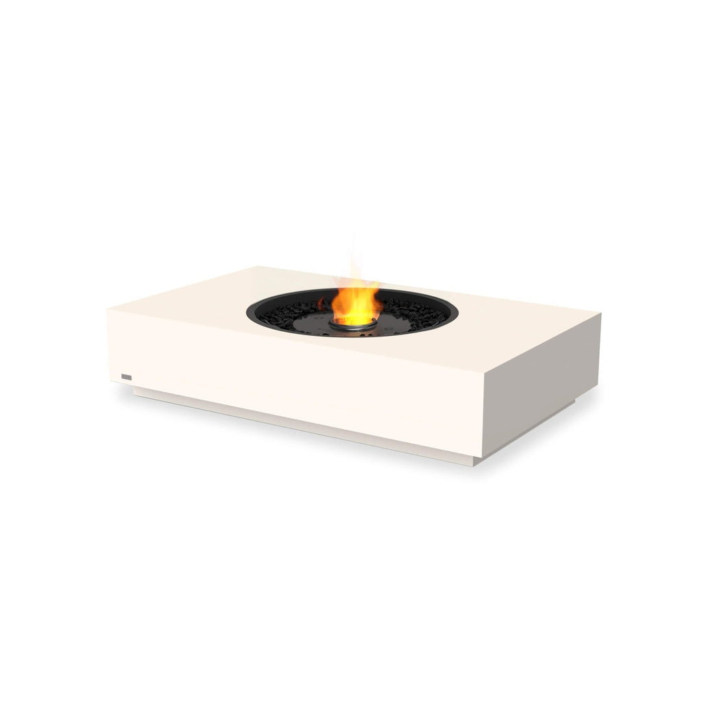 EcoSmart Fire Martini 50 bioethanol fire pit table in cream with a central black burner and flickering orange flame.