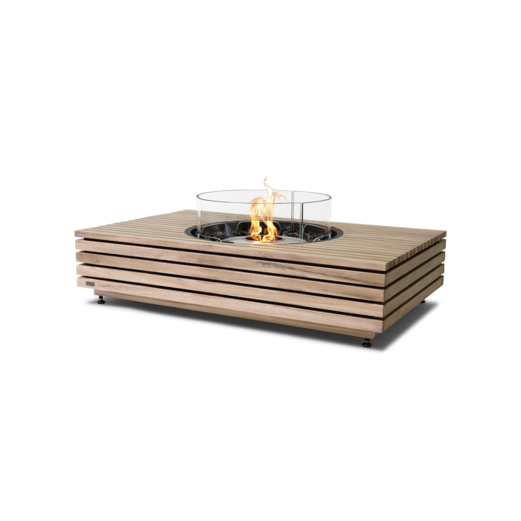 EcoSmart Fire Martini 50 bioethanol fire pit table in slatted natural wood with a central glass flame screen.