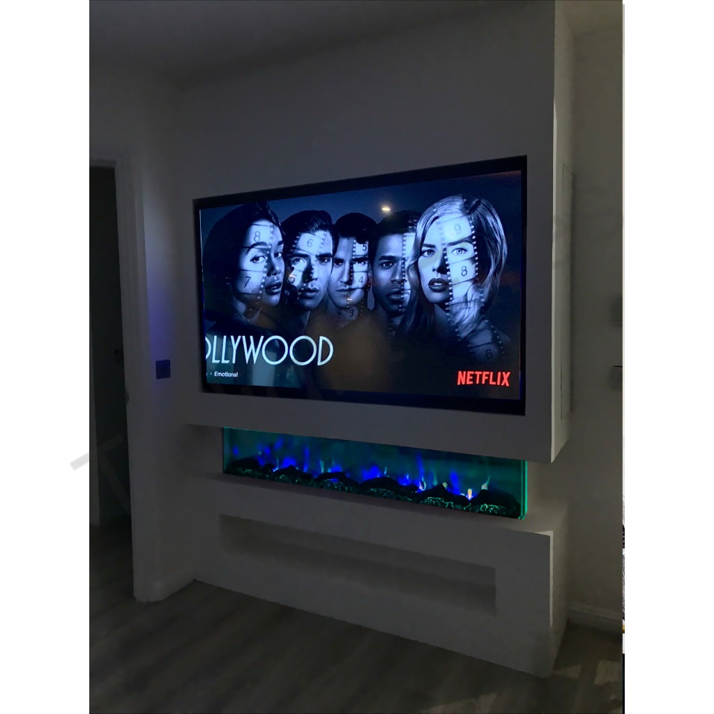 Luvelle 80” panoramic electric fire installed in a white media wall below a television displaying a Netflix film.