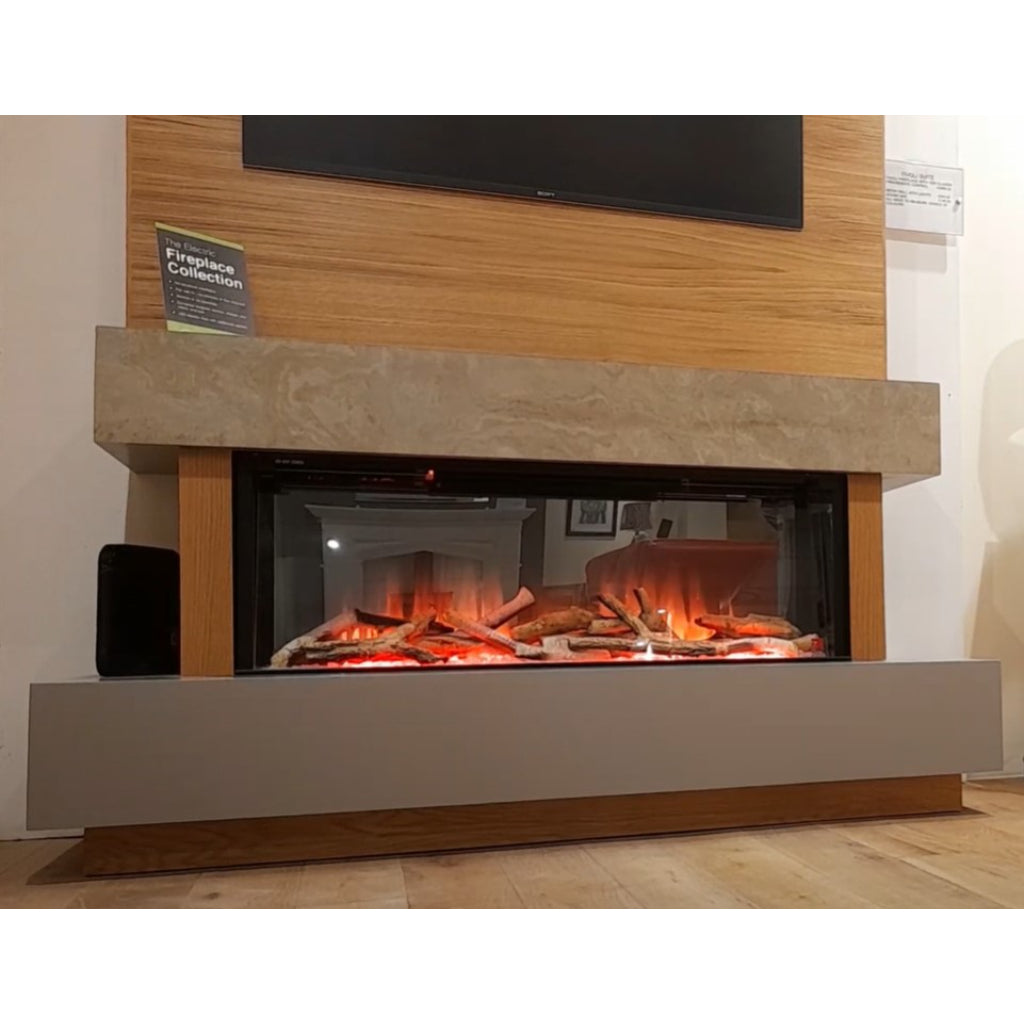 OER Tivoli Electric Fireplace Suite with a stone mantel, wooden back panel, and a wide glass-fronted log fire display.