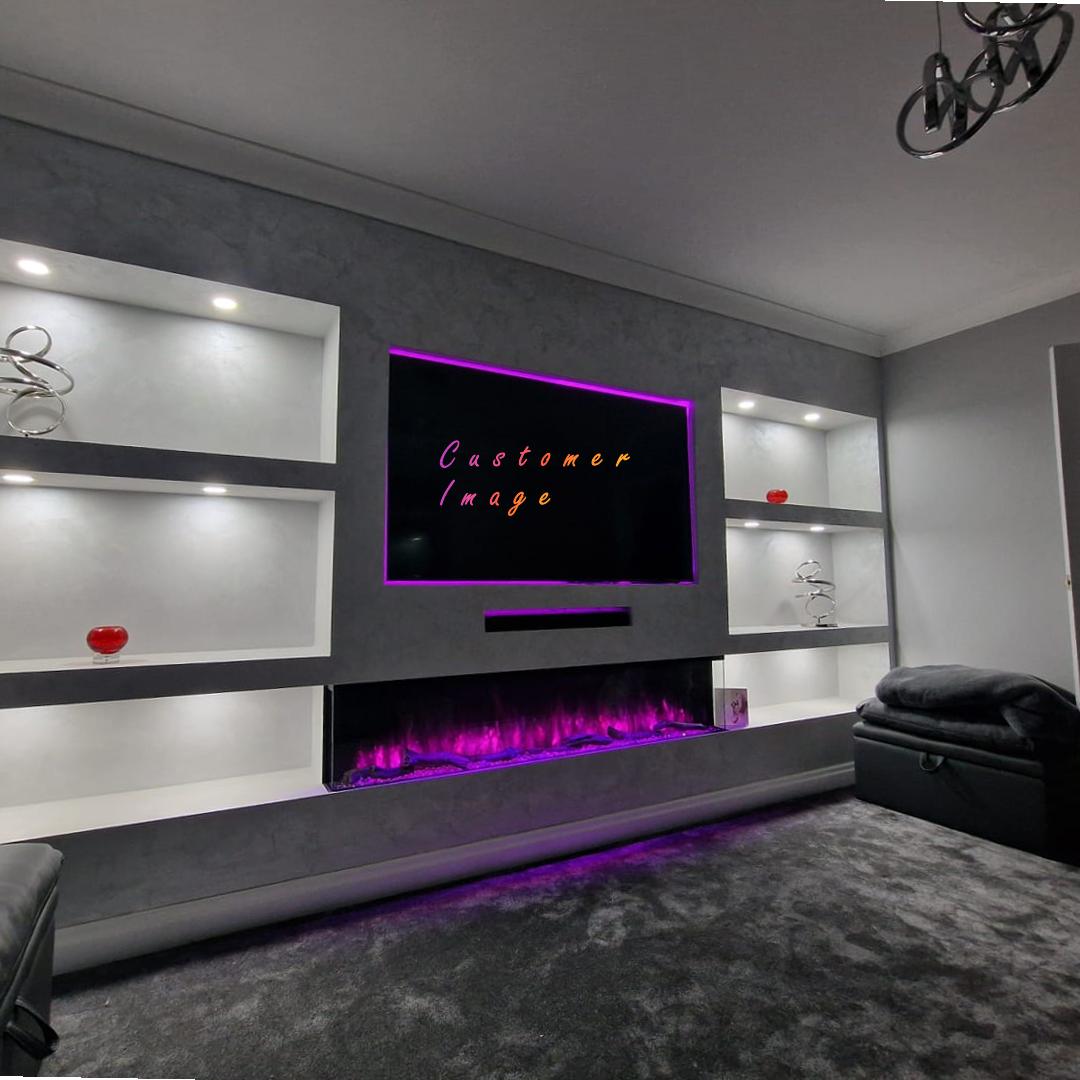 Slimline panoramic electric fire in a grey media wall with purple LED flames and integrated illuminated shelving.