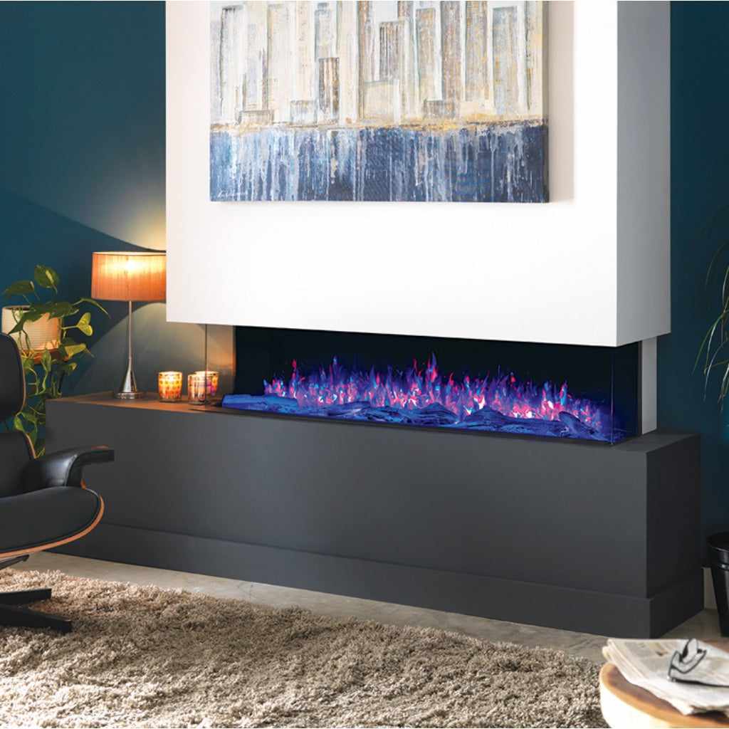 Solution Fires SLE100 HD panoramic electric fire with blue and pink LED flames in a modern black media wall insert.