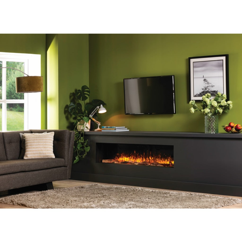 Solution Fires SLE100 HD electric fire with realistic orange flames, set in a modern black media wall against a green wall.