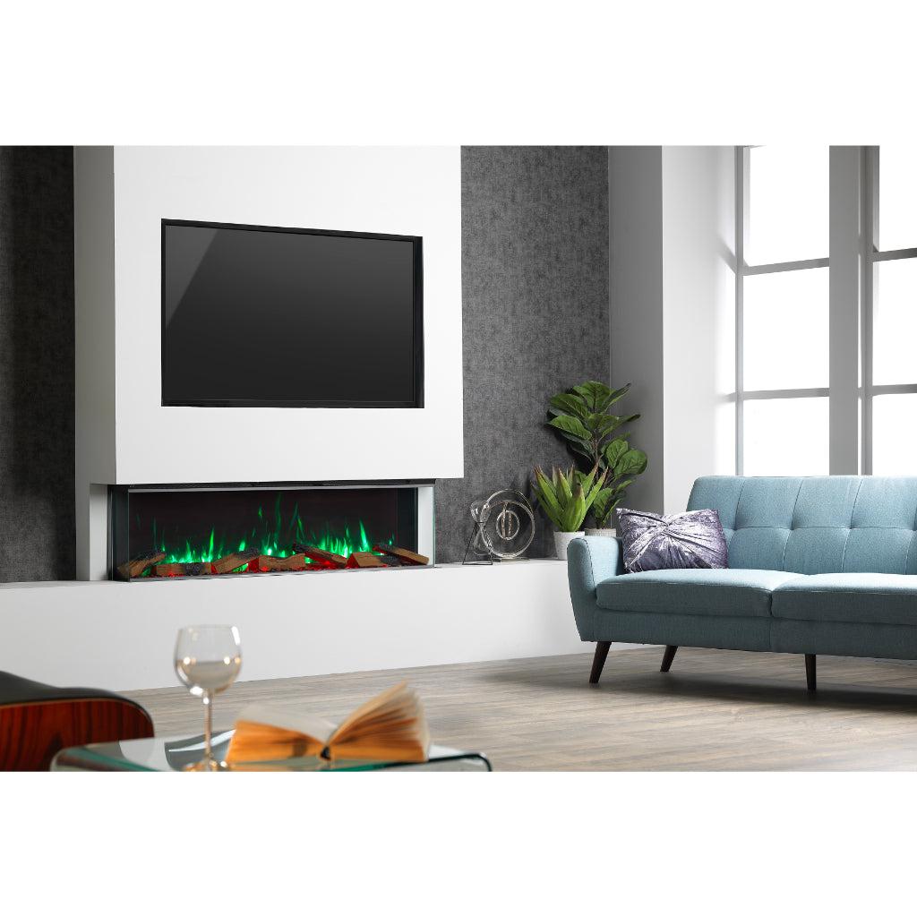 Vision Futura 60 inch 3-sided electric fire with green flames, set in a white media wall below a mounted television.