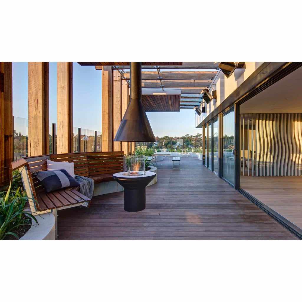 EcoSmart Fire AB3 ethanol burner with a black conical flue on a modern wooden deck terrace.