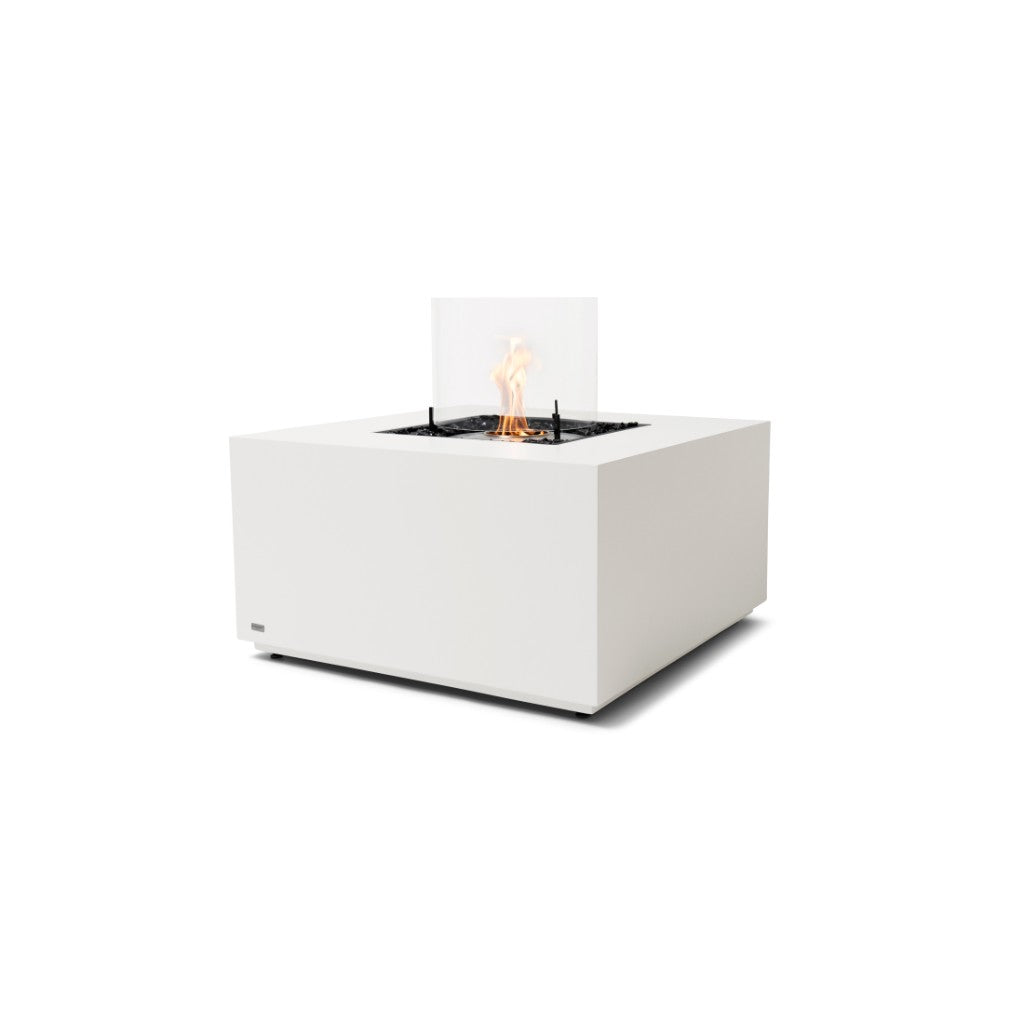 EcoSmart Fire Chaser 38 square white bioethanol fire pit table with a central flame and glass wind guard.