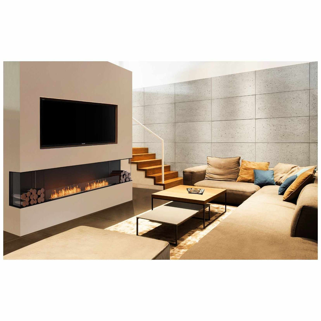 EcoSmart Fire Flex 104 bioethanol fireplace insert with a long flame in a modern living room with a wall-mounted TV.