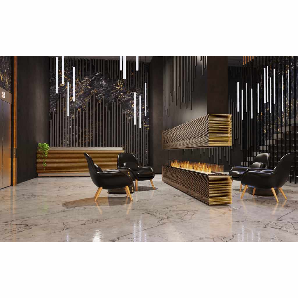 EcoSmart Fire Flex 18 bioethanol fireplace with a gold slatted base in a modern lobby with black chairs and marble floors.