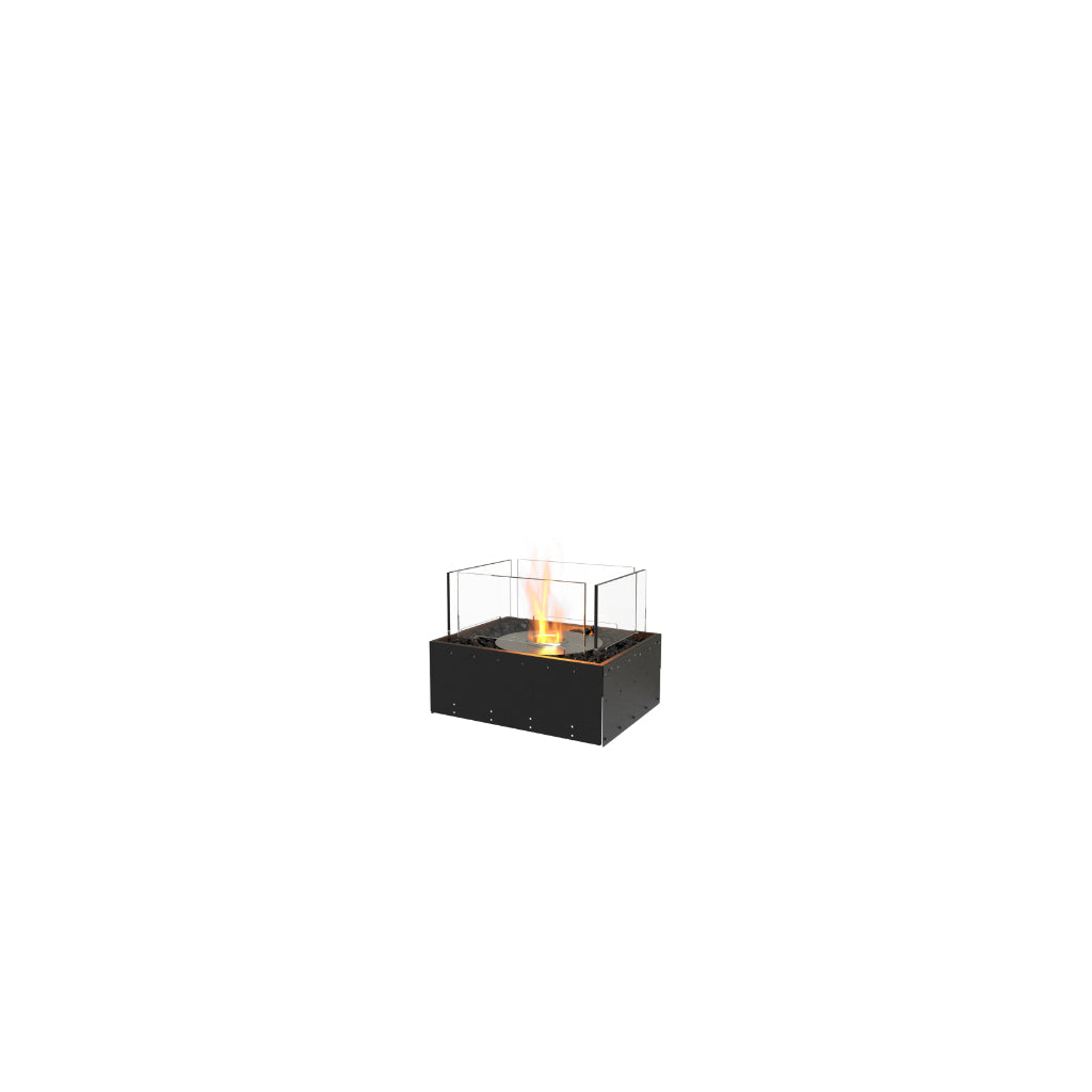 EcoSmart Fire Flex 18 bioethanol fireplace with a black metal base, glass surround, and a central flickering flame.