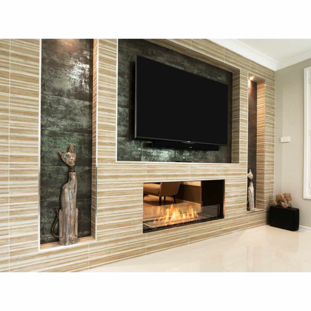 EcoSmart Fire Flex 18 bioethanol fireplace insert set in a tiled wall with a mounted television and decorative alcoves.