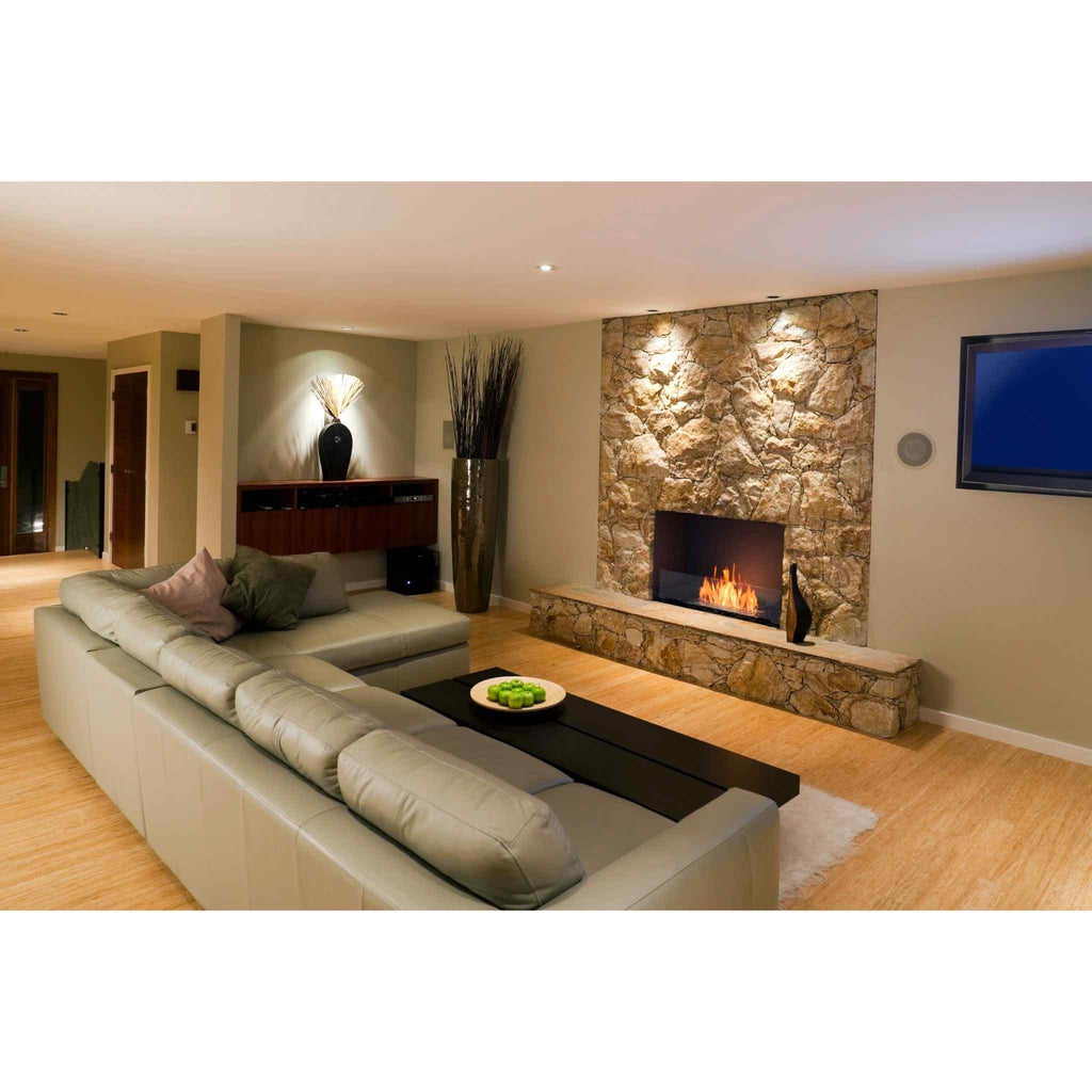 EcoSmart Fire Flex 32 bioethanol fireplace insert set into a rustic stone feature wall in a modern living room.