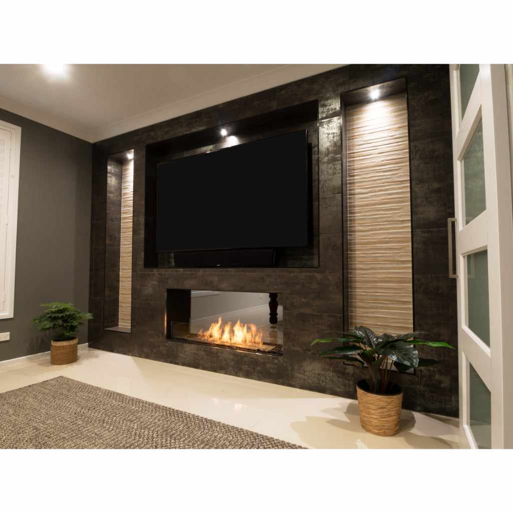 EcoSmart Fire Flex 32 bioethanol fireplace insert set into a dark tiled feature wall below a wall-mounted television.