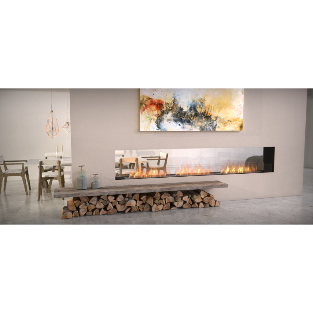 EcoSmart Fire Flex 42 bioethanol fireplace with a long linear flame, set in a wall above a rustic log storage bench.