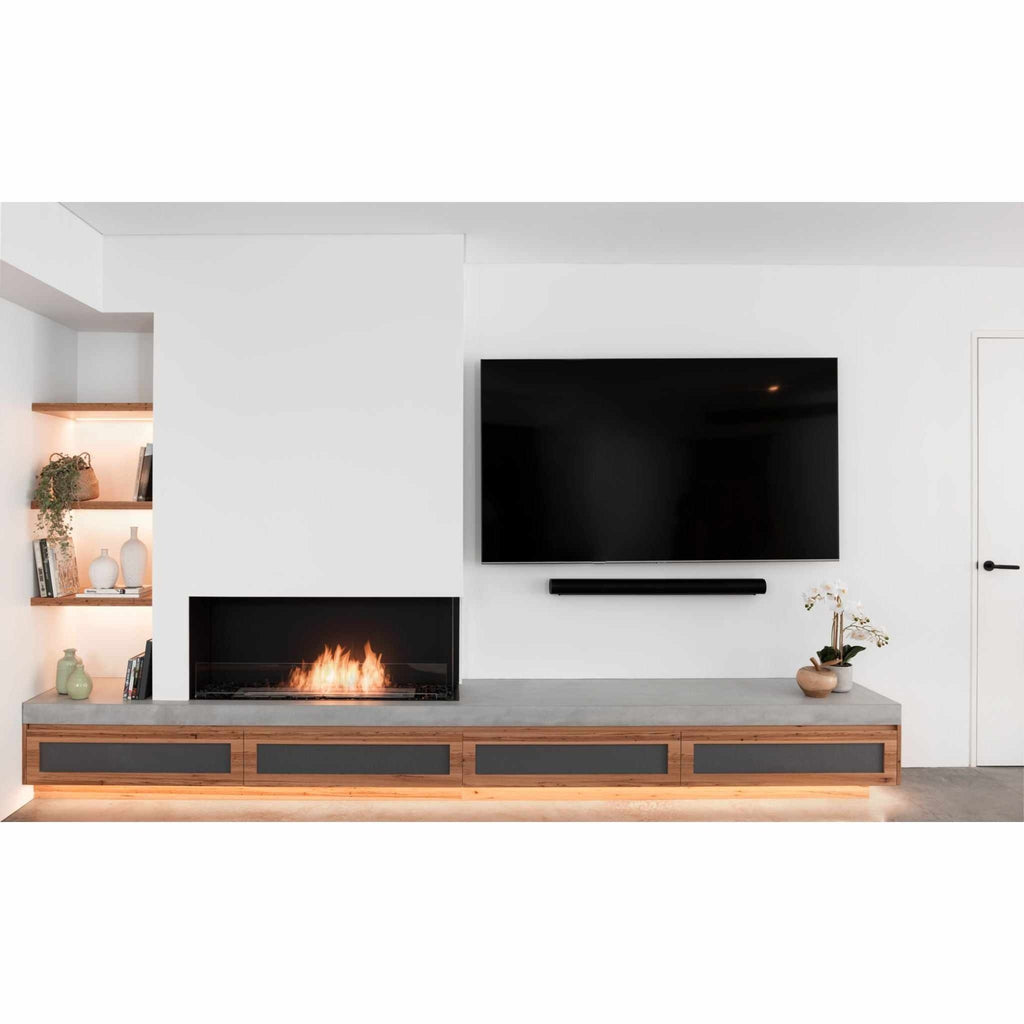 EcoSmart Fire Flex 50 fireplace insert with a glowing flame, set in a modern concrete and wood media console.
