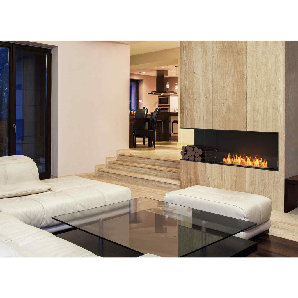 EcoSmart Fire Flex 50 bioethanol fireplace with black frame set into a beige stone wall in a modern living room.