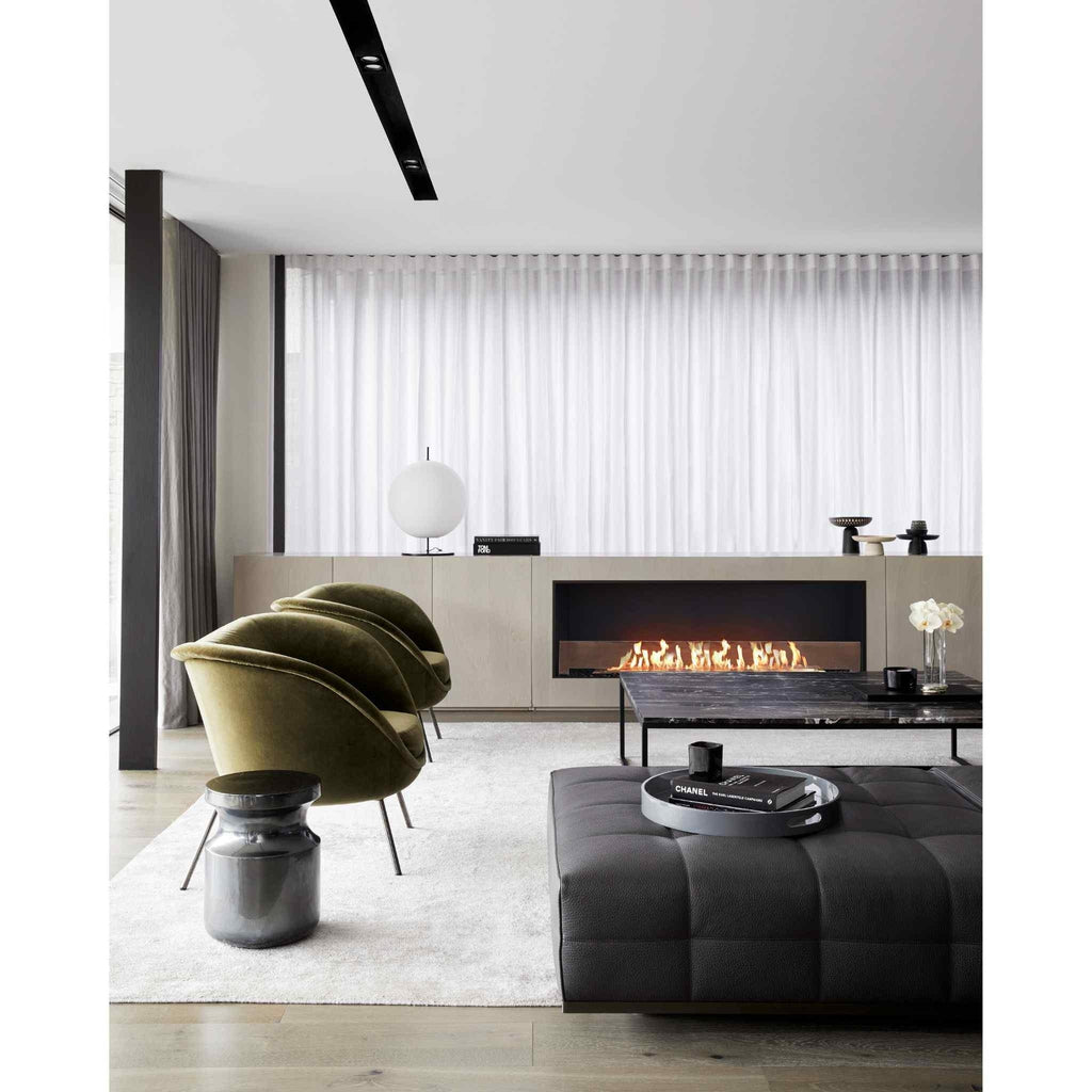 EcoSmart Fire Flex 60 bioethanol fireplace insert with a linear flame in a modern, neutral-toned living room.
