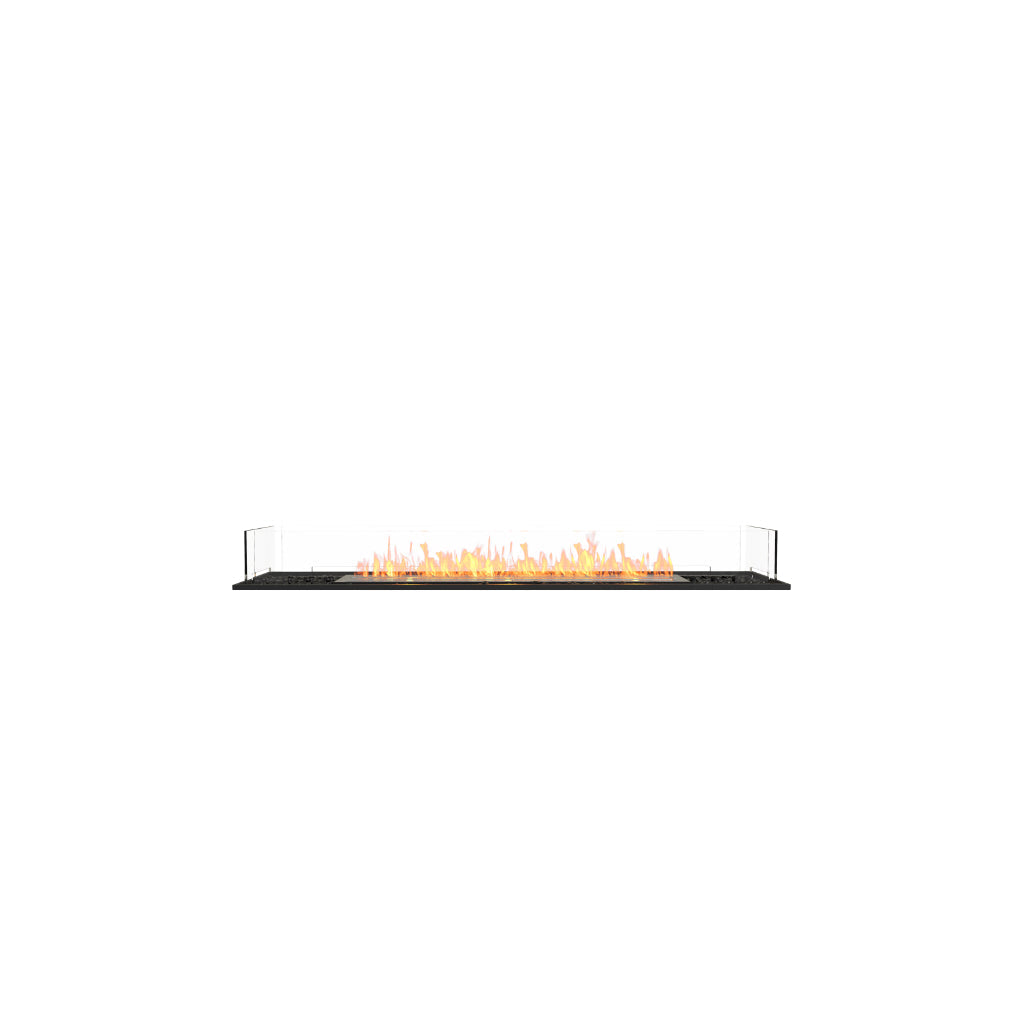 EcoSmart Fire Flex 68 bioethanol fireplace with a long linear flame, black base, and clear glass side panels.