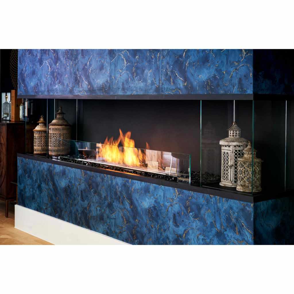 EcoSmart Fire Flex 86 fireplace with a blue marble-effect surround, glass panels, and decorative metal lanterns.