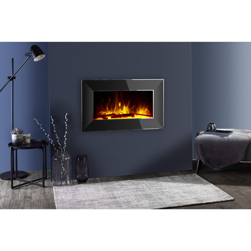 Flametek Treviso hole in the wall electric fire with a black glass frame and realistic glowing log flame effect.