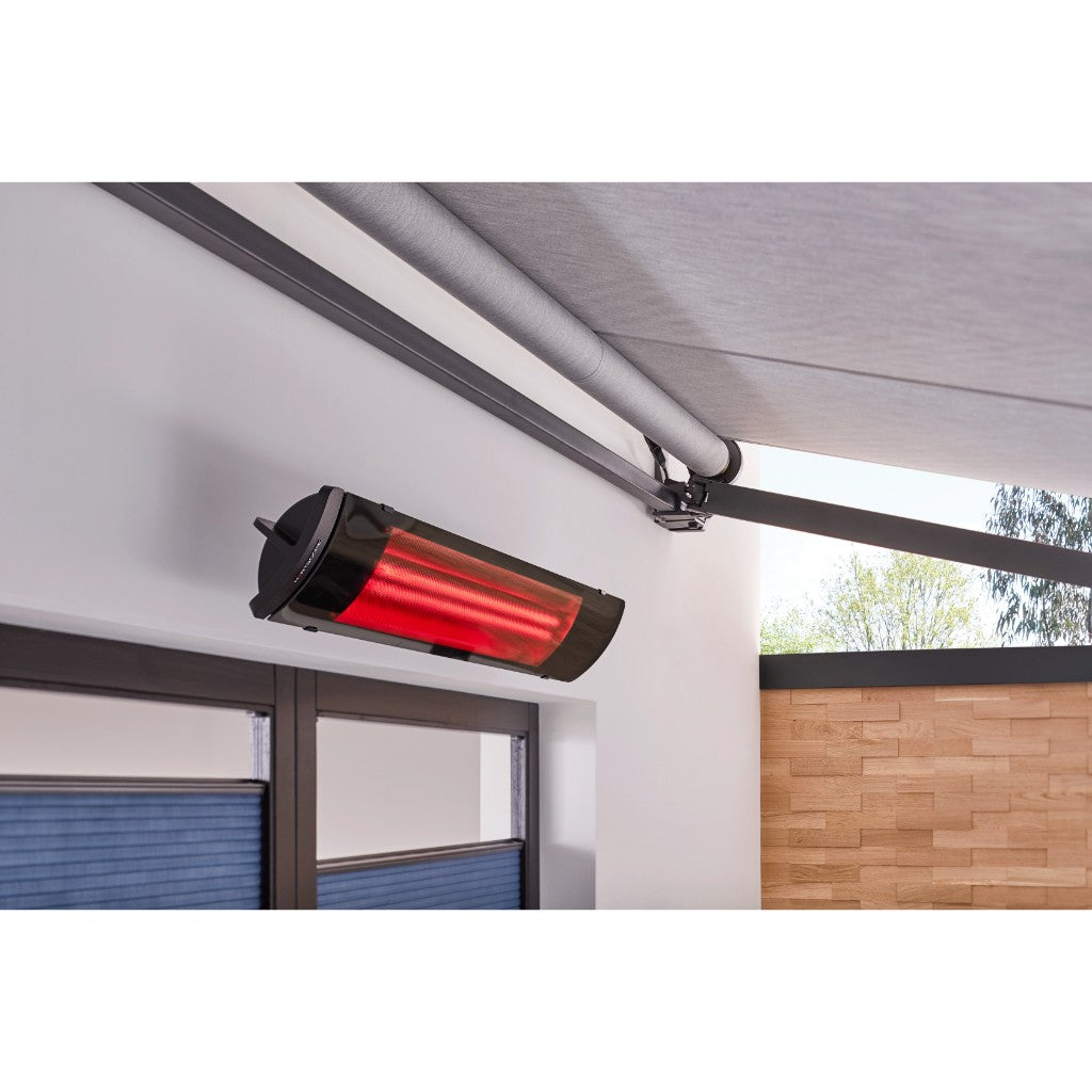 Heatscope Heaters Pure 2400W electric radiant heater mounted on a white wall with a glowing red heating element.
