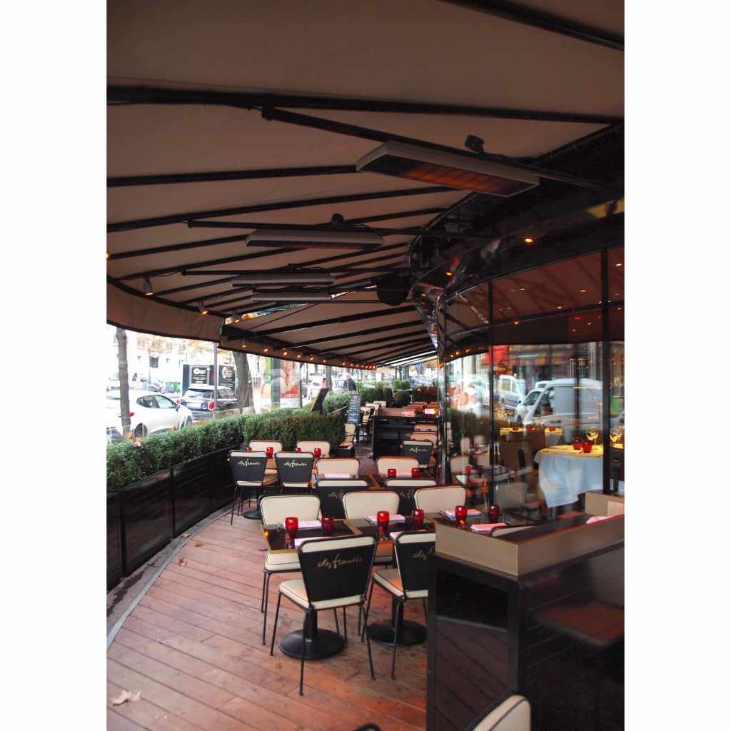 Heatscope Heaters Spot 2800W electric radiant heater mounted on the ceiling of an outdoor restaurant terrace.
