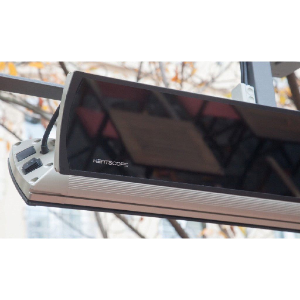 Heatscope Heaters Vision 3200w electric radiant heater with a black glass front and metallic silver casing.