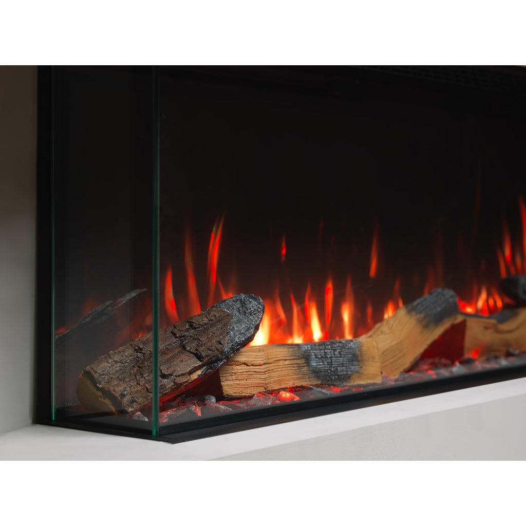 Vision Futura 1300 electric fire with realistic glowing logs and vibrant orange flames behind a glass front.