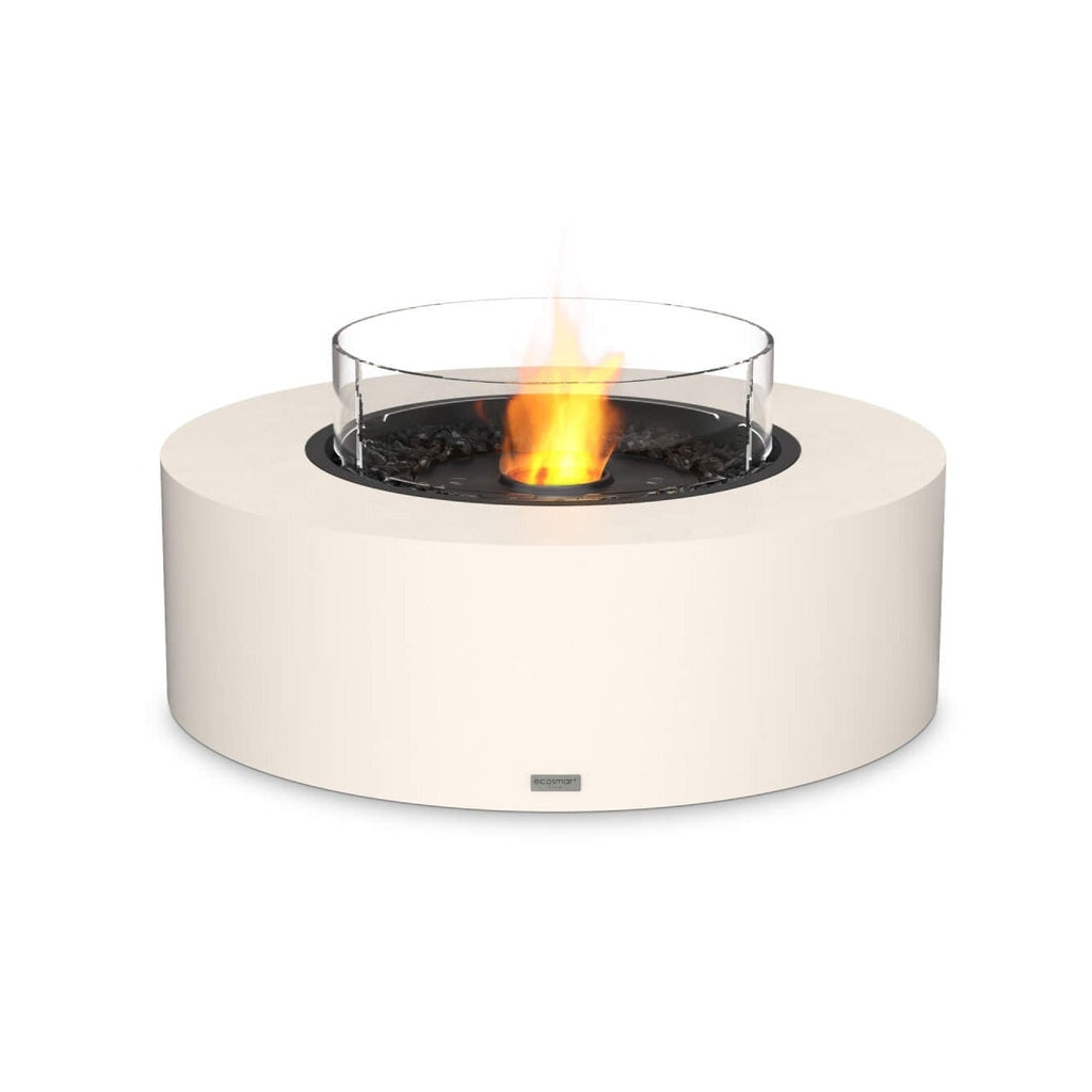 EcoSmart Fire Ark 40 bioethanol fire pit with a round cream base, black burner, and circular glass wind guard.
