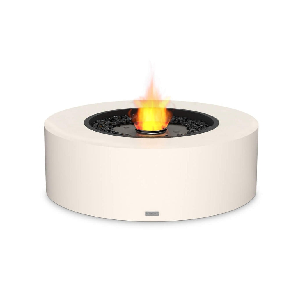 EcoSmart Fire Ark 40 bioethanol fire pit table in cream with a black burner and glowing orange flame.