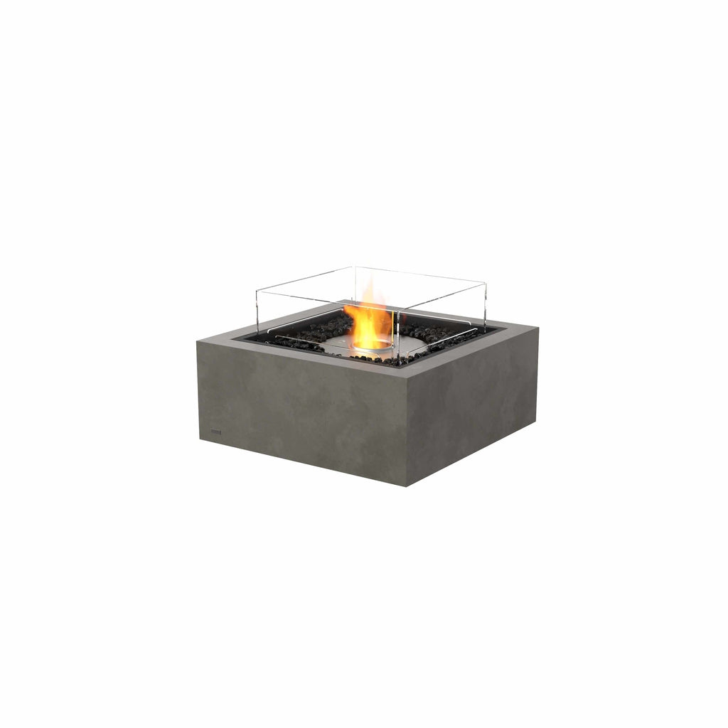 EcoSmart Fire Base 30 bioethanol fire pit in grey concrete with a square glass screen and burning flame.