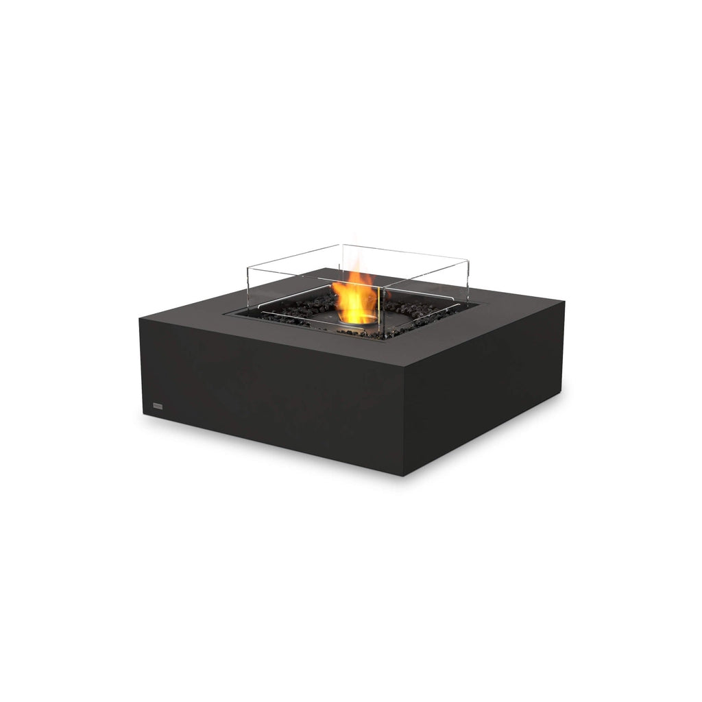 EcoSmart Fire Base 40 bioethanol fire pit table in matte black with a square glass screen and central flame.