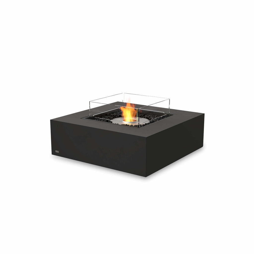 EcoSmart Fire Base 40 bioethanol fire pit table in black with a square glass screen and central flame.
